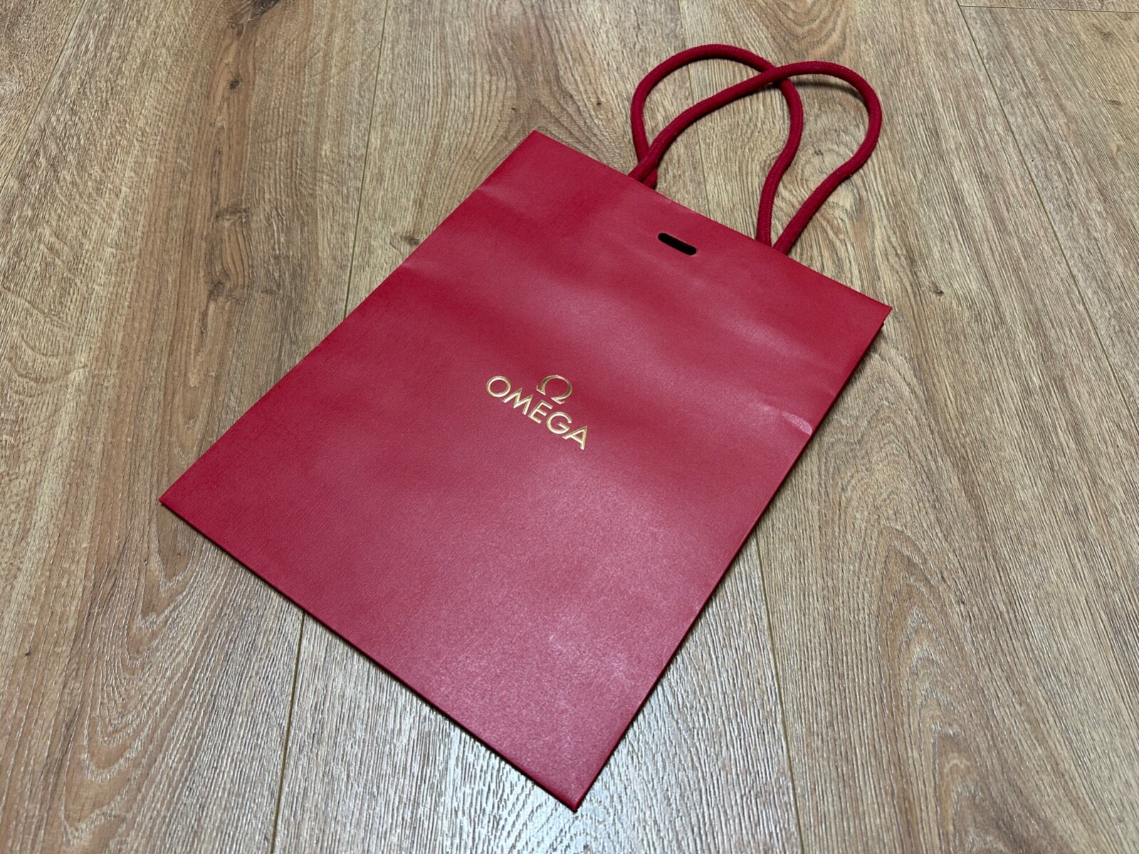 OMEGA – Paper Bag – 28 X 22 X 9 Cm – Red