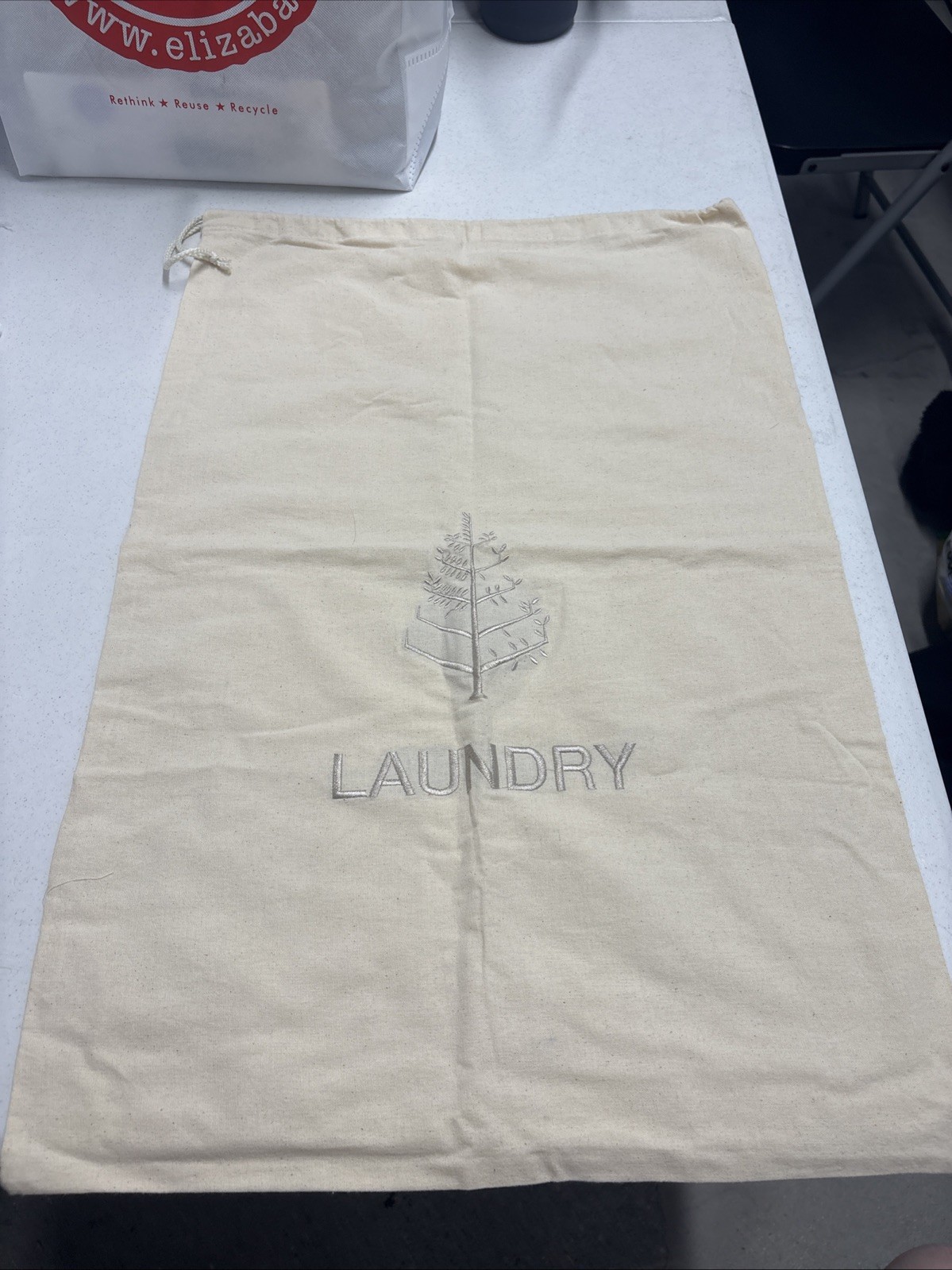 FOUR SEASONS Ivory/Beige Canvas Drawstring Laundry Bag. 25.5”x17.25”.