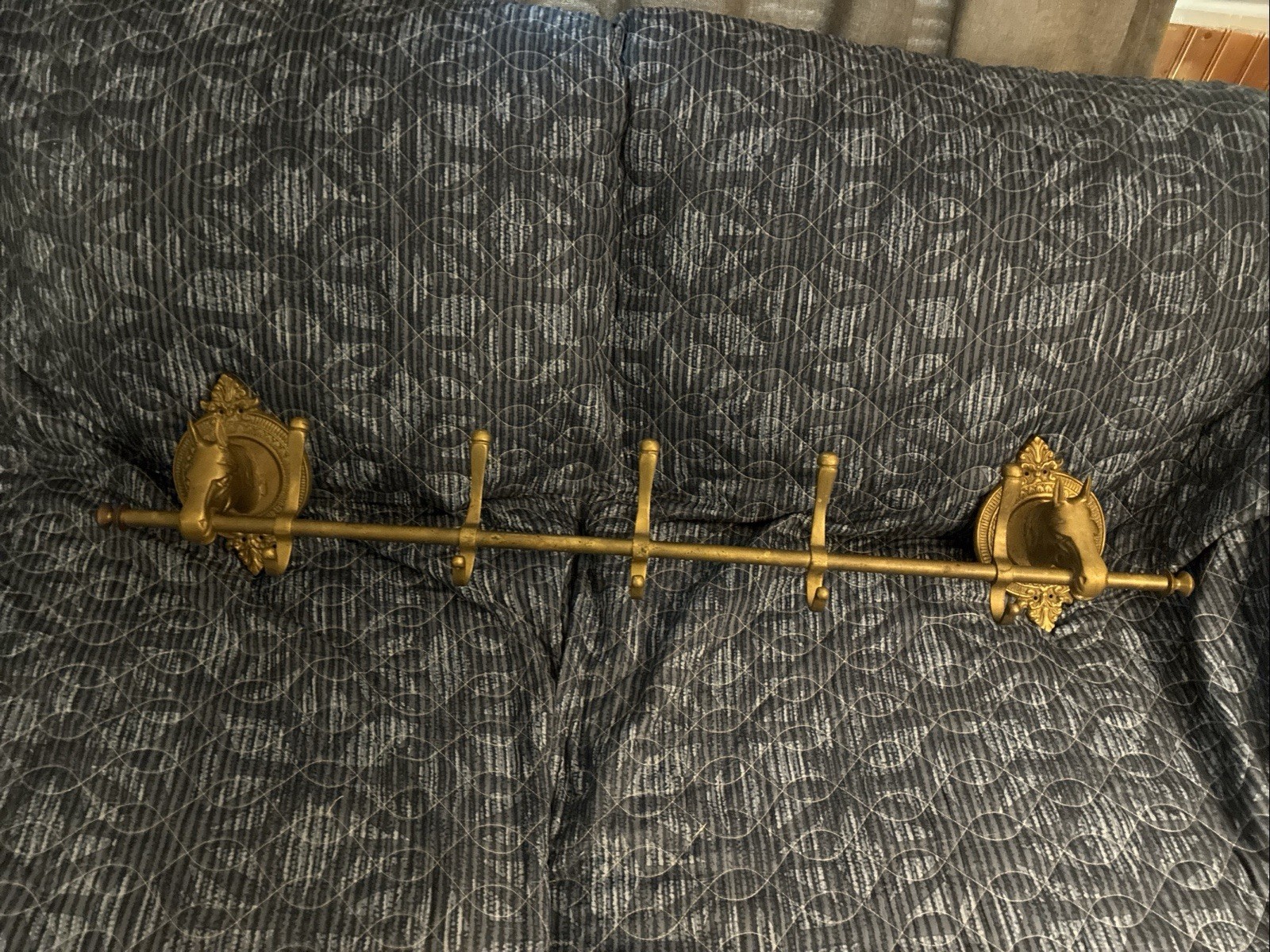 Rare vintage brass horse head coat rack. 39in over all length, mid 19th century.