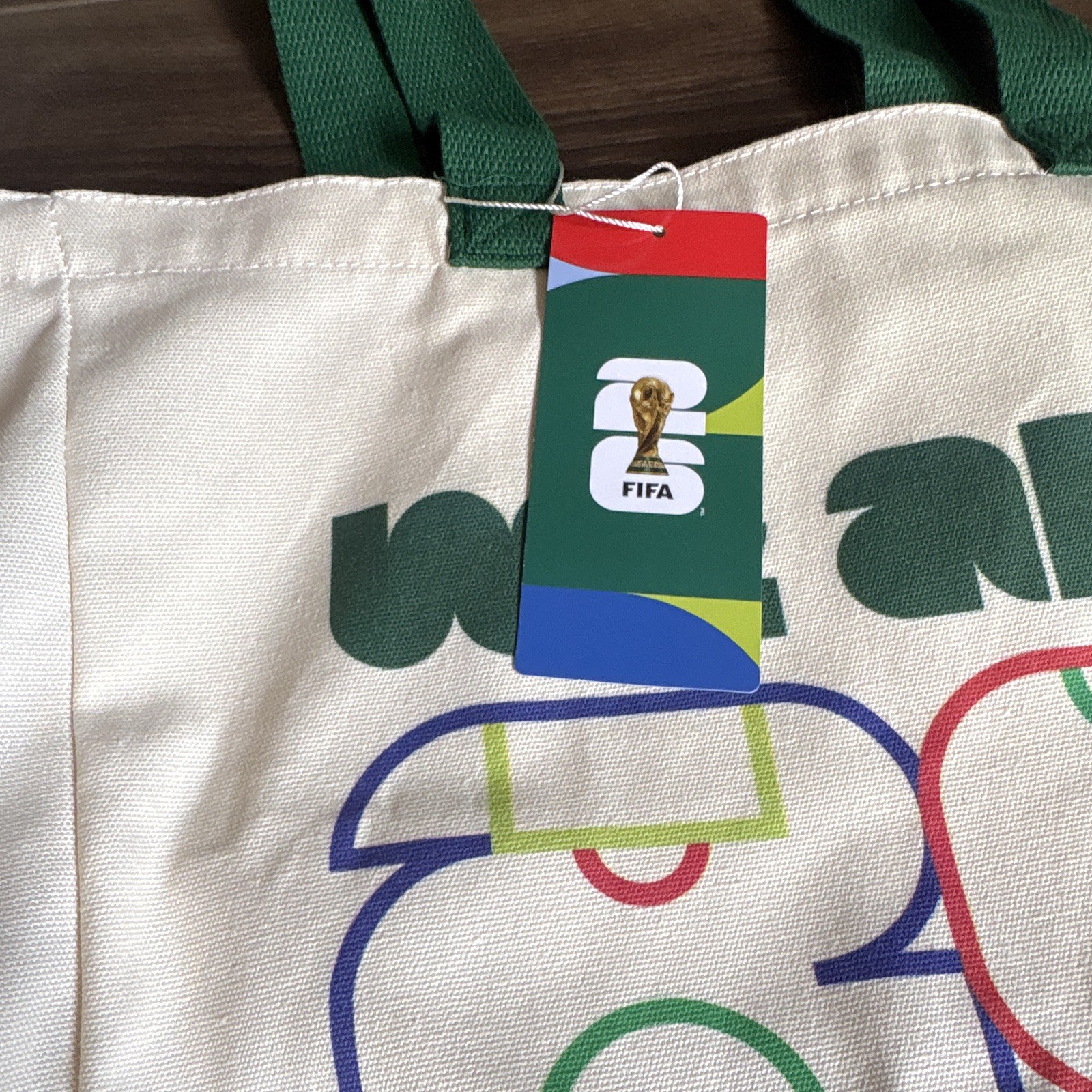 FIFA We Are 26 Logo Canvas Tote Bag Beige/Green Handles 17.5×25 in