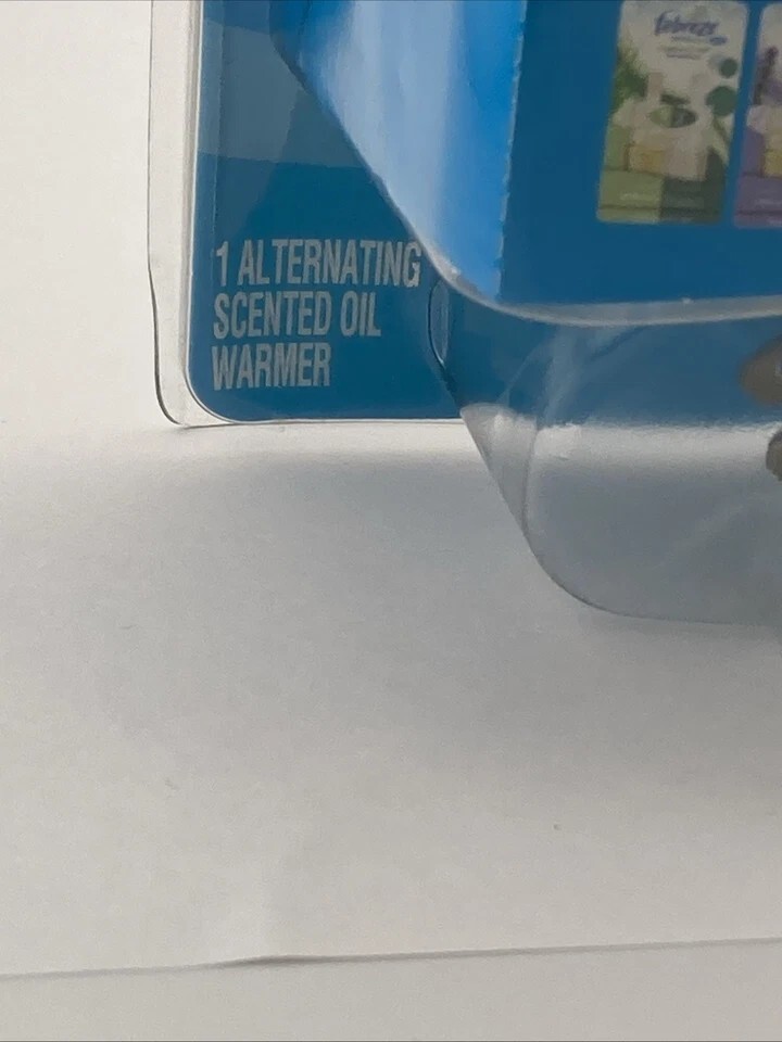 Febreze NOTICEables Scented Oil Warmer Plug In 2 in 1 Air Freshener NO REFILL