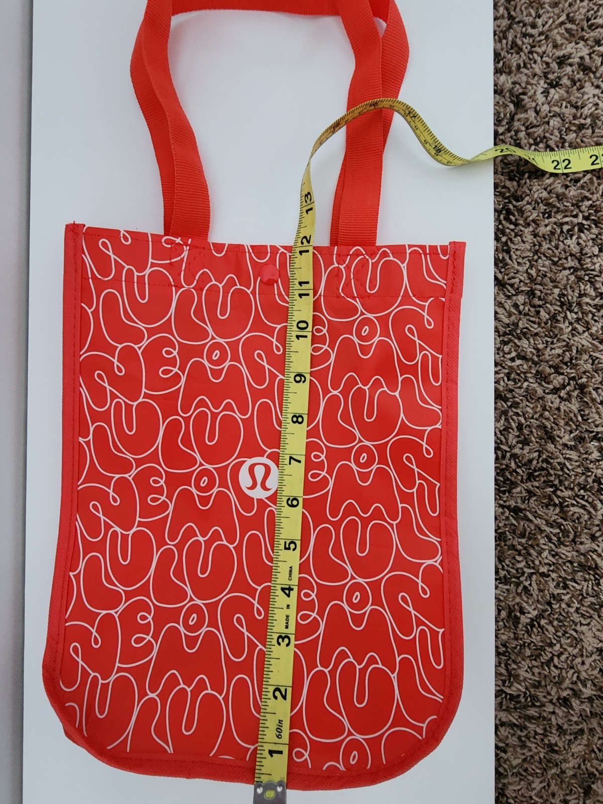Lululemon Small Logo Reusable Shoppers Bag Red w/ logos all over front and back.