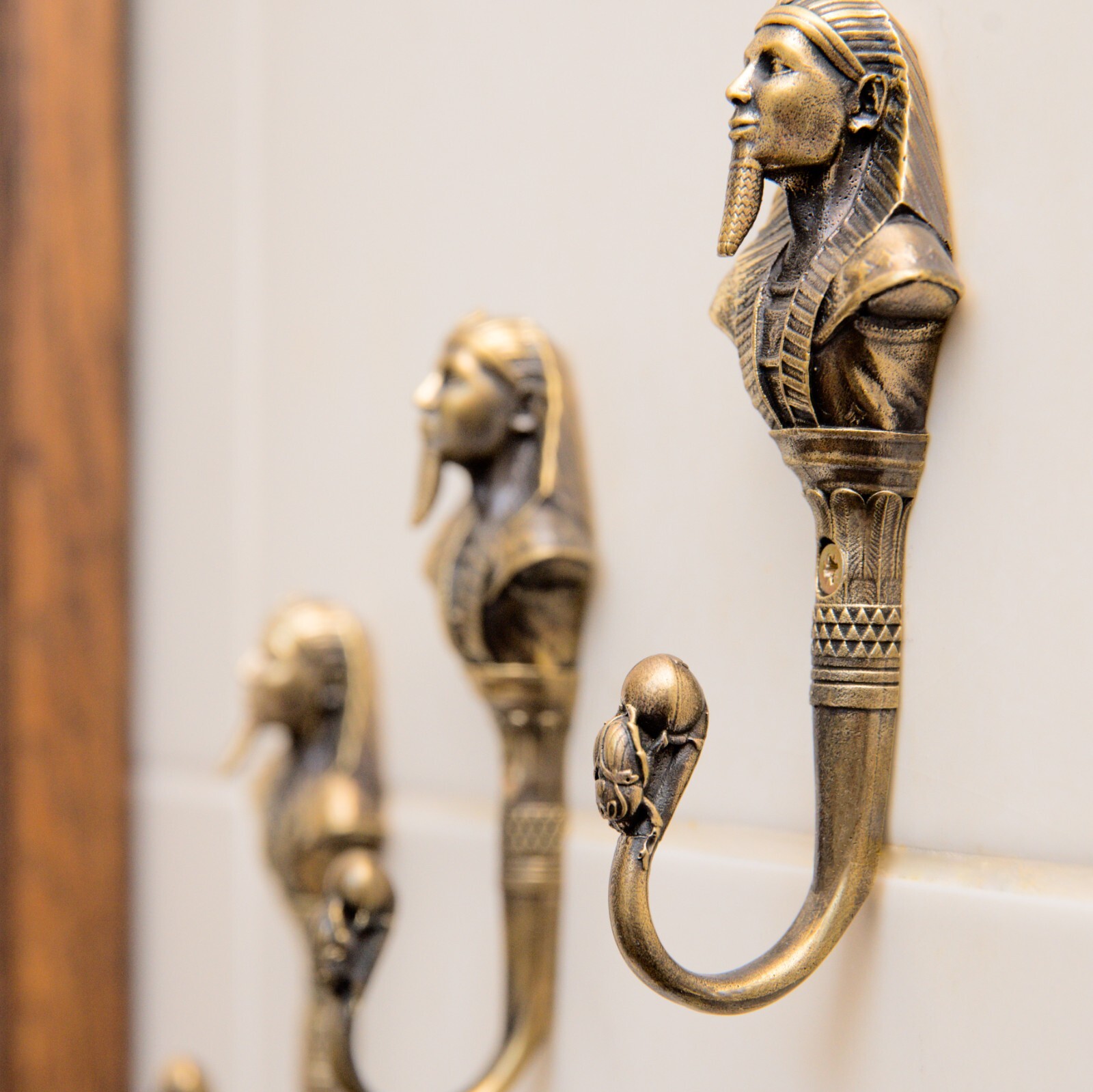 Pharaoh wall hook, a solid brass hook in the style of ancient Egypt.