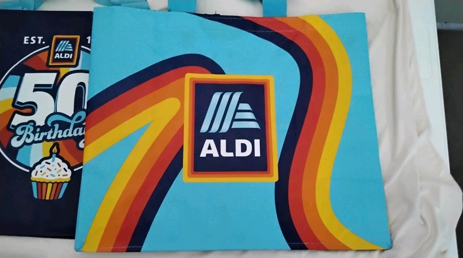 ALDI LOT New 50th B-Day CLICK AND STAY & Rainbow Bags + BURGER Quarter Keychain