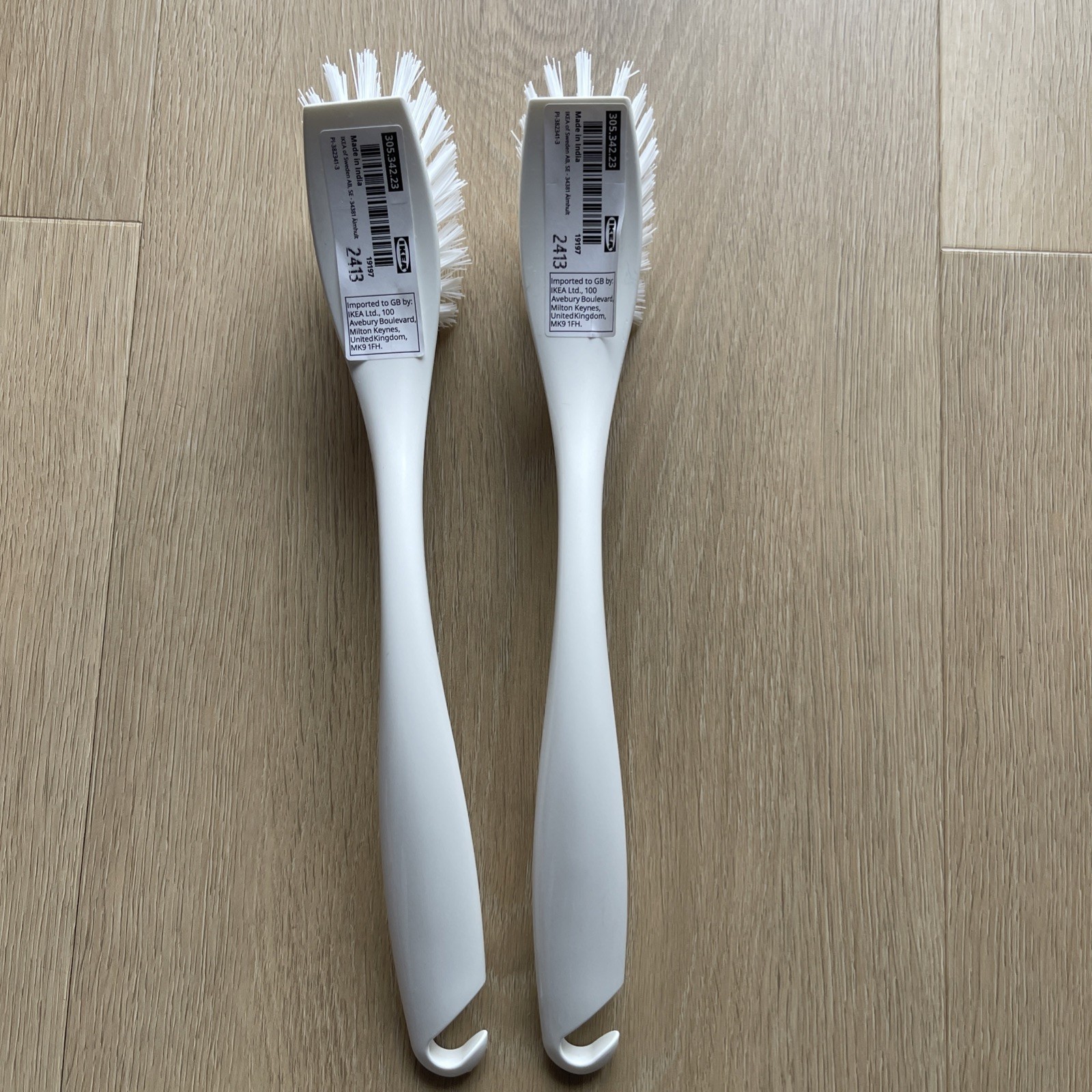 Two white IKEA Hook Cleaning Washing Scrub Brushes-Safe For Nonstick Cookware