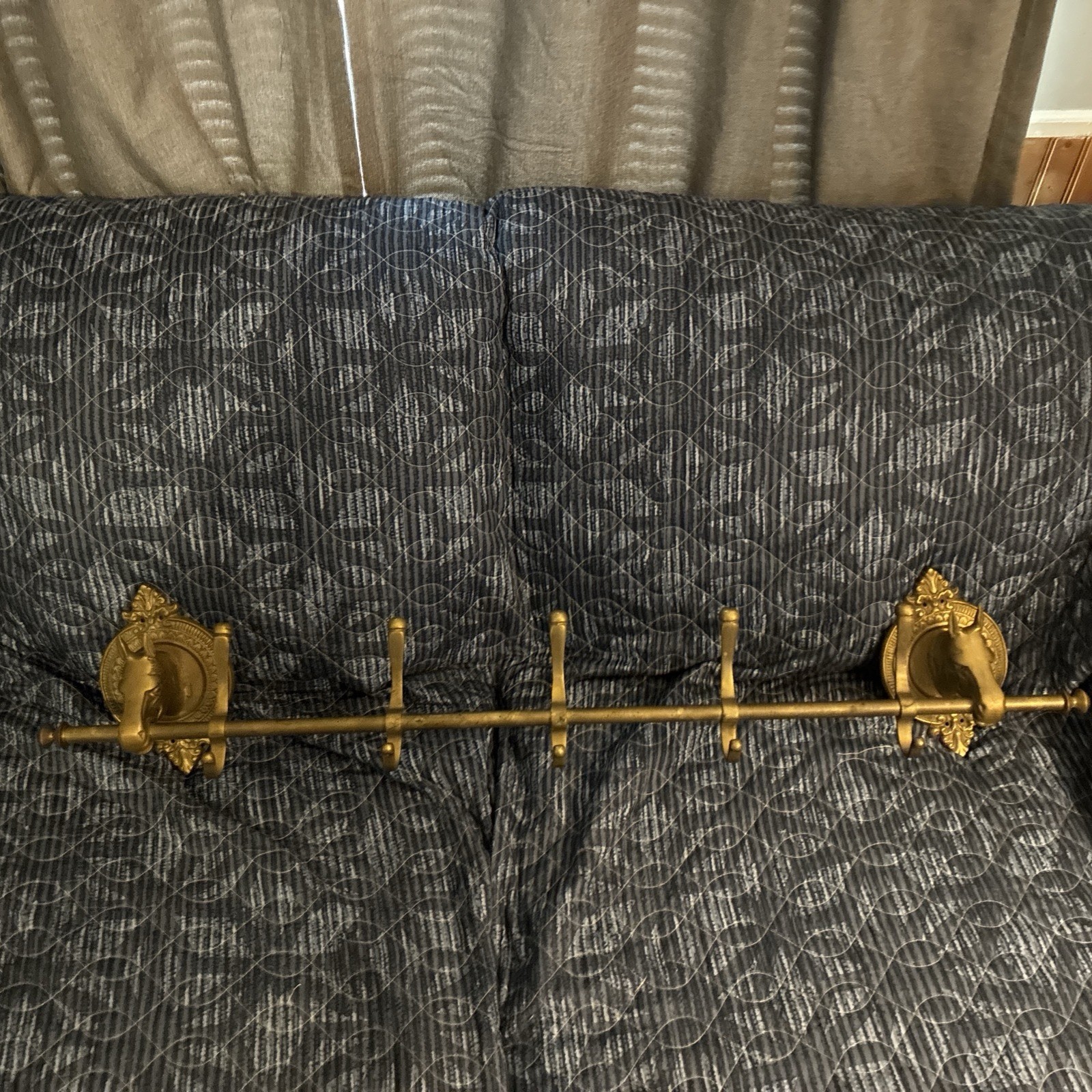 Rare vintage brass horse head coat rack. 39in over all length, mid 19th century.