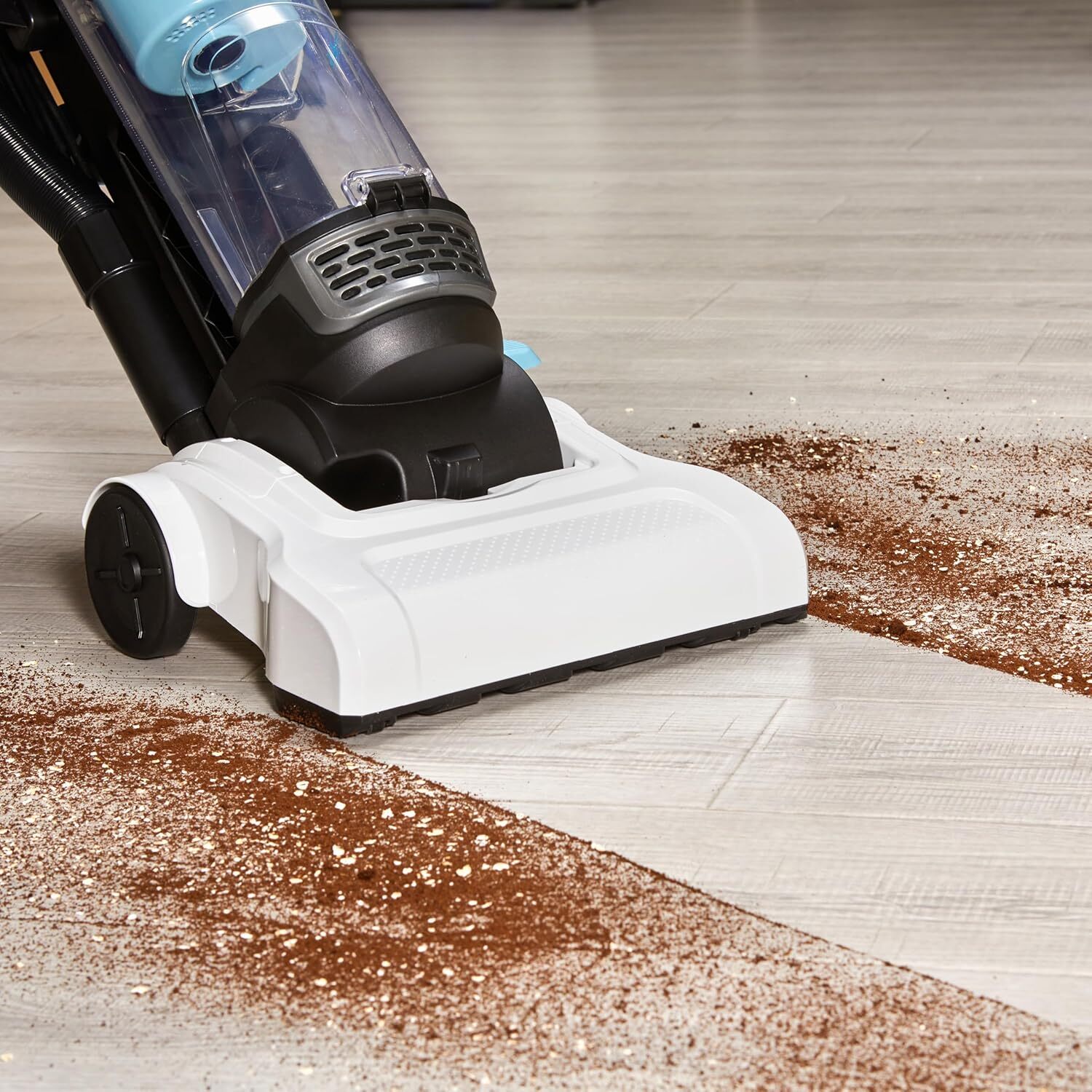 Upright bagless vacuum cleaner for carpets and hard floors