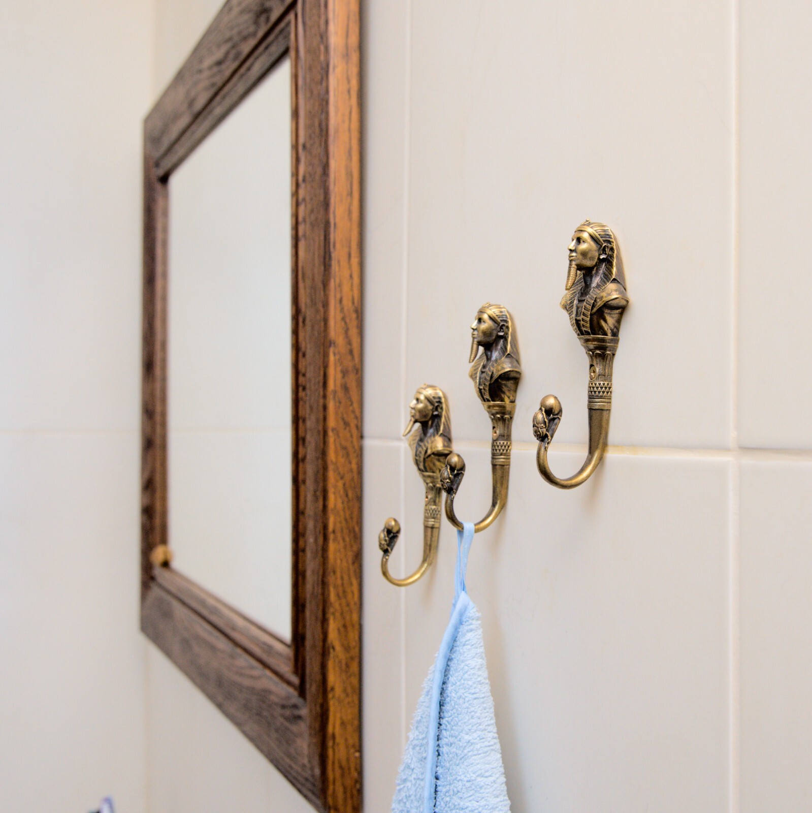 Pharaoh wall hook, a solid brass hook in the style of ancient Egypt.