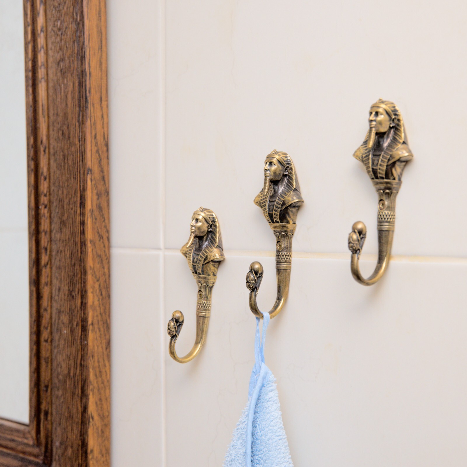 Pharaoh wall hook, a solid brass hook in the style of ancient Egypt.