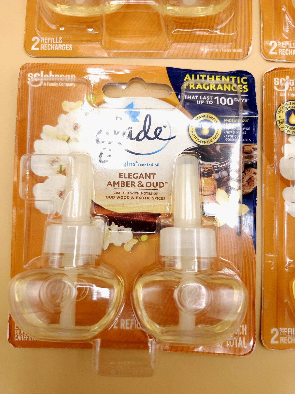 (4) Glade Plugins Refills Amber & Oud Wood Scented Oil 2-Packs w/ Essential Oils