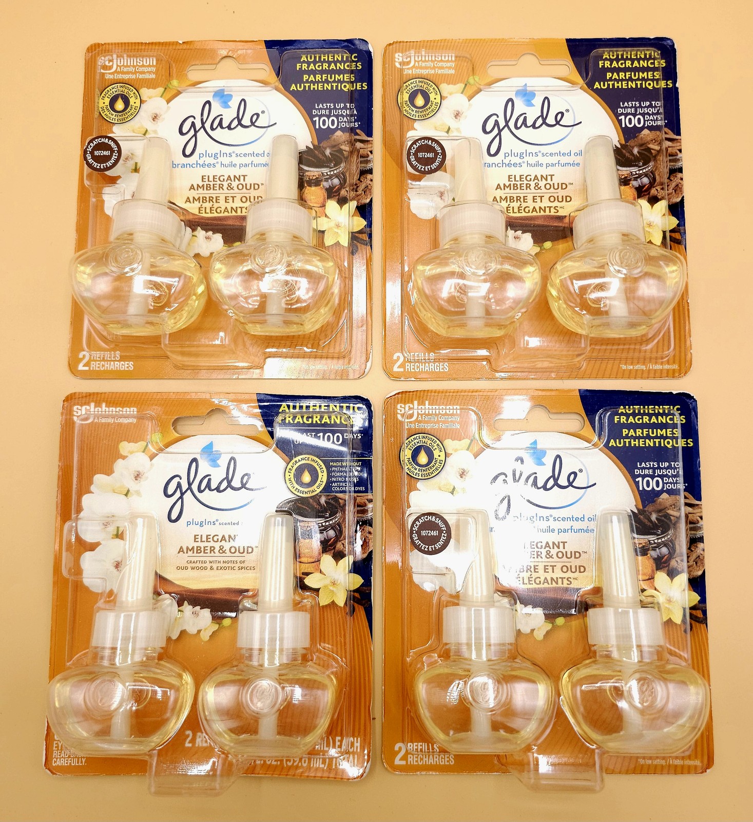 (4) Glade Plugins Refills Amber & Oud Wood Scented Oil 2-Packs w/ Essential Oils