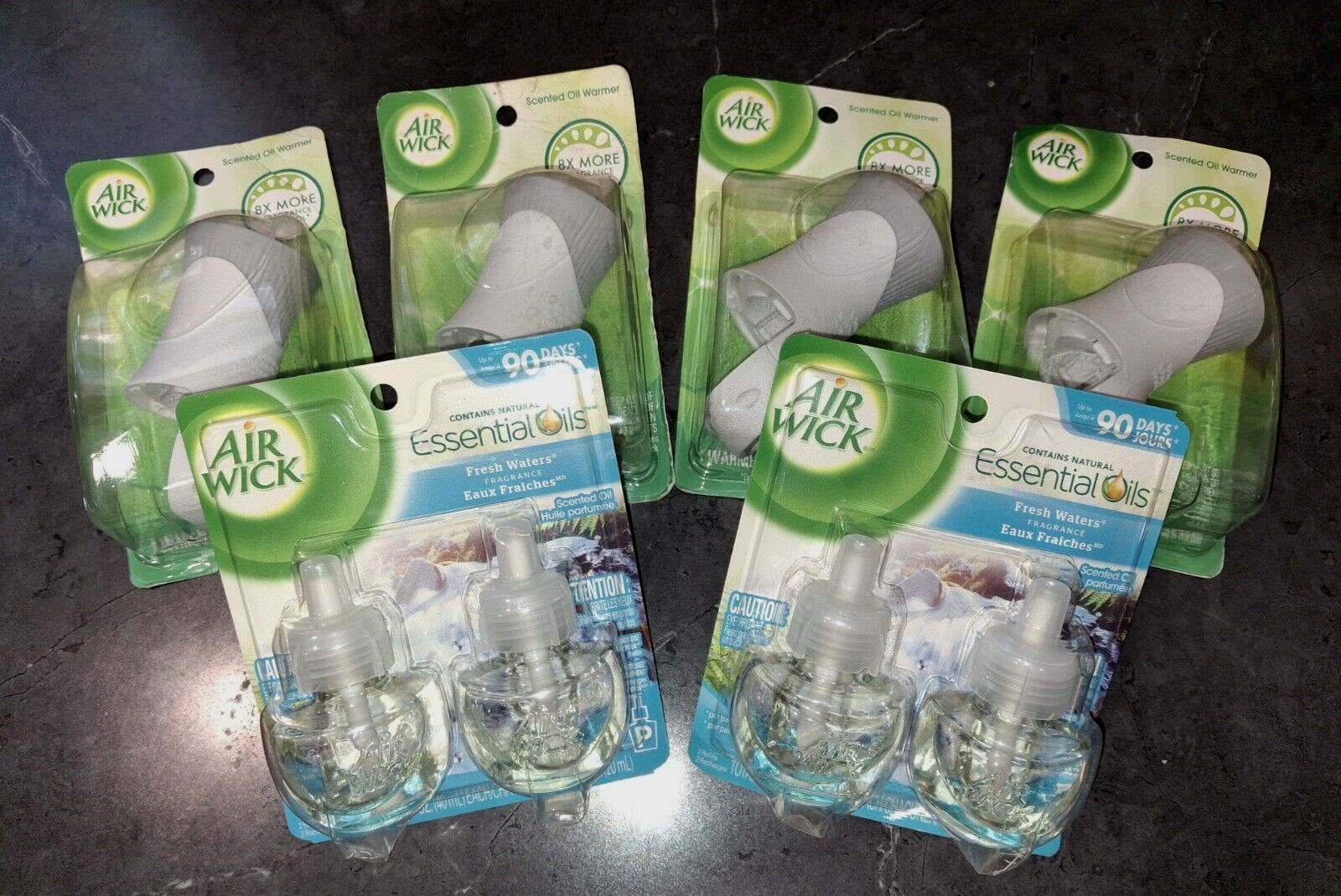 Lot of Air Wick Essential Oils (4) Warmers & (4) Fresh Waters 90 Day Refills